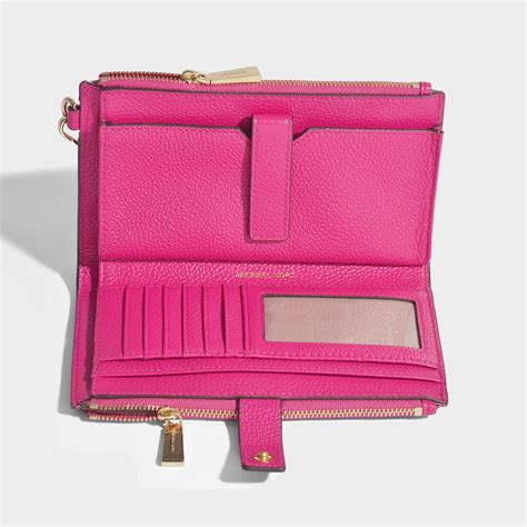 michael kors pink clutch bag|michael kors wristlet outlet.